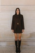 steph alise vegan suede blazer worn with the vegan suede A-line mini skirt