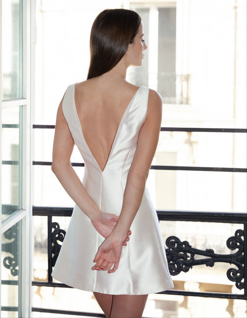 Champagne V back mini dress by steph alise with a high boatneck and fitted waist